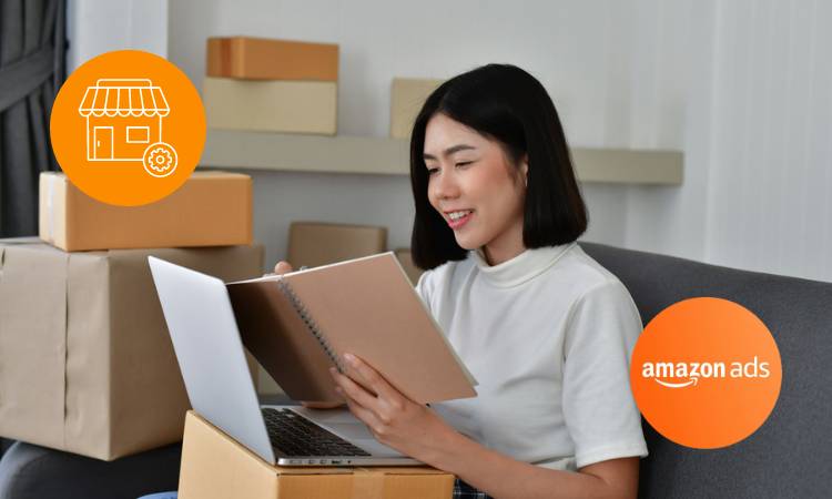 A person using a computer and a notebook, with the Amazon Ads logo