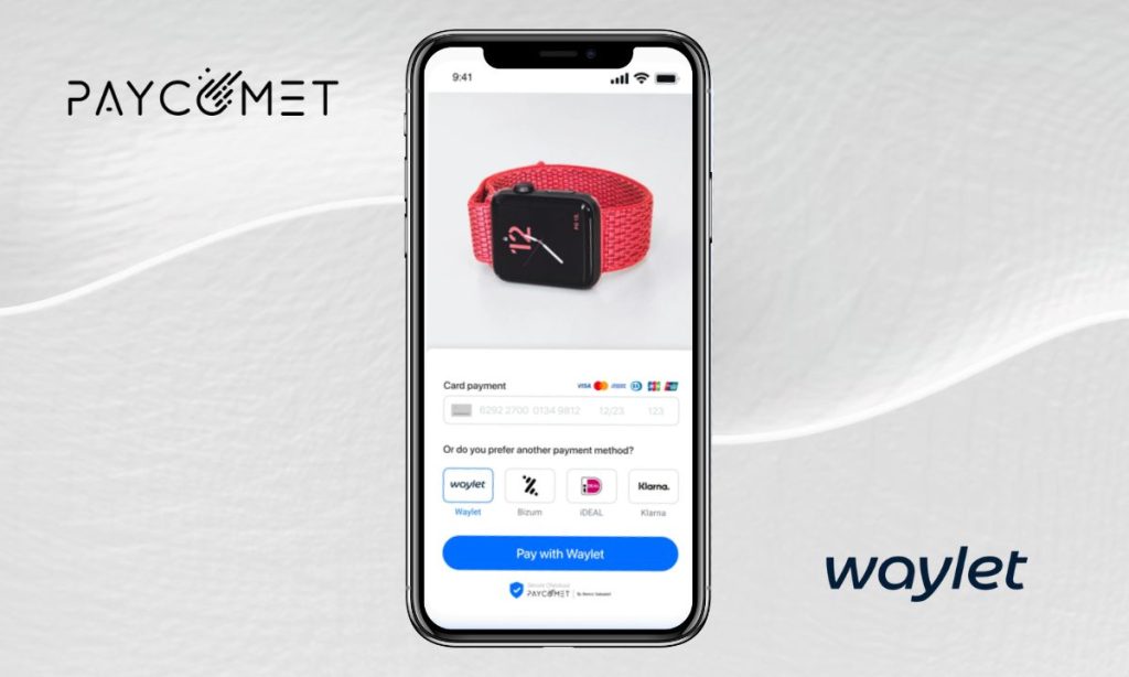 Fotografía de un teléfono móvil que muestra la pantalla de selección de método de pago de un eCommerce. En ella se ha seleccionado Waylet, la solución de pagos y fidelización que Paycomet acaba de integrar en su oferta
